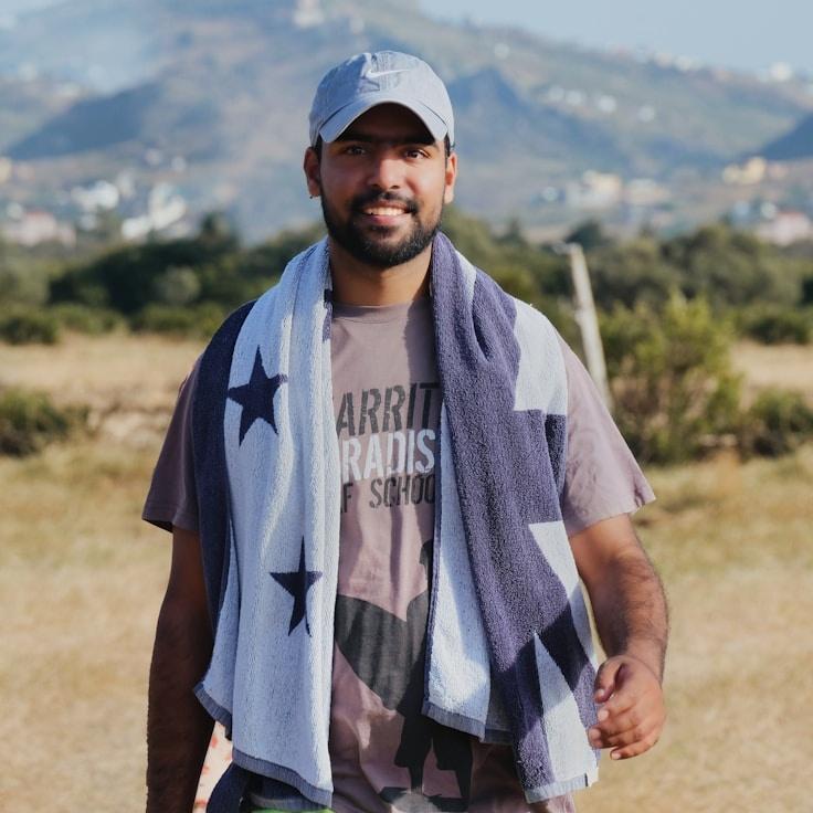 Kaveri Mehta, Lead Design Curator at Forest Globe Paper, reviewing corporate floral arrangements